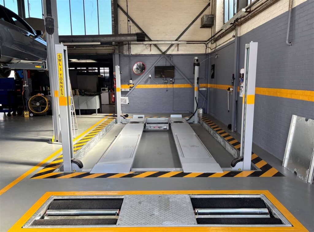 Cars being serviced at Kennington Garage